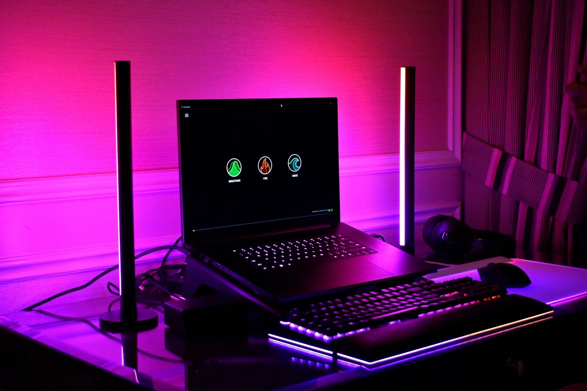 Gaming setup with keyboard and coloured lighting