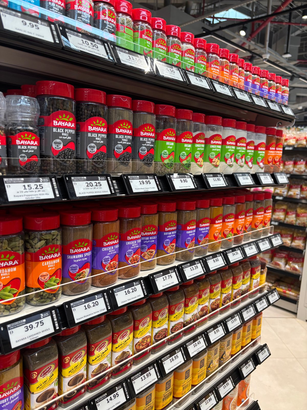 Spice shelves with electronic price labels.