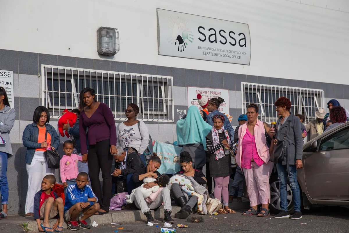 People queue outside the SASSA office in Eerste River, 10 October 2018.